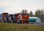 The "J", CN 3023 Heritage unit leading a unit stack train E/B through the CP Page Sub turnout just east of the Sorenson Road crossing